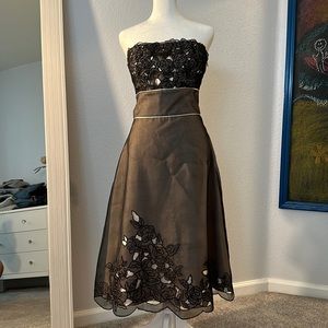 White House Black Market strapless dress.  Black and champagne silk.  Size 10